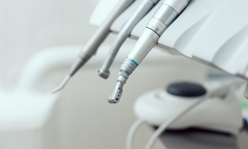Closeup of a modern dentist tools, burnishers with blurred background